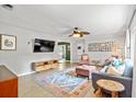 Bright living room with stylish furnishings, a ceiling fan, and plenty of natural light at 2988 Bolton Rd, Charleston, SC 29414