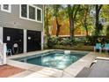 Inviting backyard pool offers a serene retreat with a fence and direct access to the house at 9 24Th Ave, Isle of Palms, SC 29451