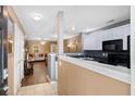 Spacious kitchen leading to the living room, perfect for entertaining at 104 Buchanan Cir, Goose Creek, SC 29445