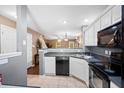 Functional kitchen area with white cabinets and modern appliances at 104 Buchanan Cir, Goose Creek, SC 29445