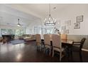 Open concept design showcasing a formal dining area with hardwood floors at 177 Sugar Magnolia Way, Charleston, SC 29414