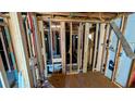 Unfinished bathroom shows plumbing, framing and a sink ready for customization at 1946 Clement Ave, North Charleston, SC 29405
