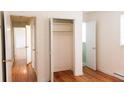 Bright bedroom with hardwood floors and an open closet at 250 Clarine Dr, Goose Creek, SC 29445