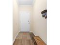 Entryway with tile transitioning to hardwood flooring and a convenient key rack at 700 Daniel Ellis Dr # 3208, Charleston, SC 29412