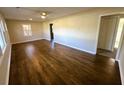 Spacious living room with gleaming hardwood floors and abundant natural light at 8 Eucalyptus Ave, North Charleston, SC 29418