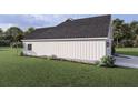 Back view of charming one story home with a well maintained lawn and black roof at Tbd Woodland Dr, Summerville, SC 29485
