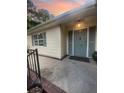 Inviting front door with blue shutters and a brick-lined walkway exudes charm at 1120 Seaside Ln, Charleston, SC 29412