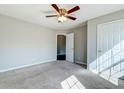 Bedroom featuring a neutral-colored carpet, ceiling fan, closet and attached bathroom at 118 Willowbend Ln, Summerville, SC 29485