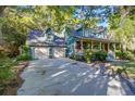 Beautiful home featuring a two-car garage and a welcoming front porch at 1417 Pine Island View, Mount Pleasant, SC 29464
