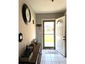 Welcoming foyer with tile flooring, decorative accents, and a convenient console table at 142 Aylesbury Rd, Goose Creek, SC 29445