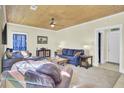 Comfortable living room featuring stylish decor, wood ceiling, and ample seating at 2021 Beckton St, North Charleston, SC 29420