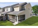 Spacious backyard featuring a screened-in porch perfect for outdoor entertaining at 344 Flyway Rd, Goose Creek, SC 29445