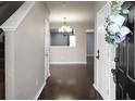 Inviting foyer with gleaming hardwood floors and stylish accents, welcoming you home at 515 Flycatcher Dr, Goose Creek, SC 29445