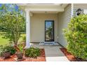 Charming home featuring a covered front porch and a decorative glass front door at 515 Flycatcher Dr, Goose Creek, SC 29445