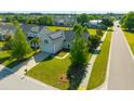 Charming home aerial view with solar panels, lush green lawn and street view at 7601 Stargazer Dr, Hanahan, SC 29410