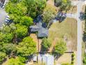 Areal view of the property's roofline, surrounding trees, and proximity to nearby street at 1128 Melvin Bennett Rd, Mount Pleasant, SC 29464