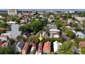An aerial view captures the architectural charm and beautiful green landscaping of this neighborhood at 152 Coming St St, Charleston, SC 29403