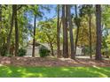 A lovely home nestled among tall trees and lush greenery in a quiet neighborhood at 2575 The Haul Over, Seabrook Island, SC 29455