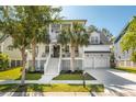Charming two-story home with a double garage, porch, and meticulously maintained landscaping at 4082 Blackmoor St, Mount Pleasant, SC 29466