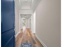 Welcoming hallway featuring wood floors and an open floor plan at 4996 Song Sparrow Way, Summerville, SC 29483