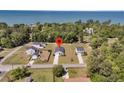 Aerial view of a residential neighborhood, showcasing the property's proximity to the coast at 707 Butter Rd, Bonneau, SC 29431