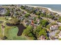 This gorgeous property enjoys a great location near the beach and golf, as highlighted in this high-angle shot at 732 Spinnaker Beachhouse, Seabrook Island, SC 29455