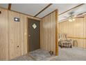 Traditional foyer with unique ceiling fan and comfortable armchair at 1019 Levi Lake Rd, Johns Island, SC 29455
