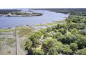 Beautiful aerial shot showcasing the waterfront property and surrounding scenic landscape at 146 Rivers Edge Way, Wando, SC 29492