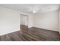 Spacious living room with modern vinyl floors, ceiling fan, neutral paint, and an open layout at 205 Lynton Ct, Goose Creek, SC 29445
