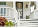 The front porch features a set of stairs, white railings, and a visible house number: 2815 at 2815 Colonel Harrison Dr, Johns Island, SC 29455