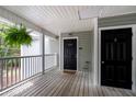 Welcoming front porch with a fern, and the door number of the condominium at 308 Pickering Ln, Charleston, SC 29414