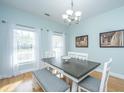 Inviting dining area with natural light and stylish furnishings at 411 Black Horse Rd, Moncks Corner, SC 29461