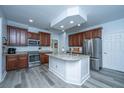 Modern kitchen featuring stainless steel appliances and a center island at 411 Black Horse Rd, Moncks Corner, SC 29461