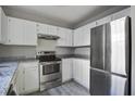 Modern kitchen featuring white cabinets, stainless steel appliances, and stylish countertops at 414 Courtland Dr, Summerville, SC 29486