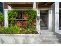 Entrance detail highlighting the privacy and artistic flair of the townhome's facade at 62 Gadsden St # A, Charleston, SC 29401