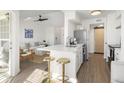 Open kitchen and living space featuring quartz counters, stainless appliances, and seating at 700 Daniel Ellis Drive # 5303, James Island, SC 29412