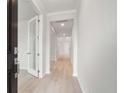 Bright hallway features hardwood floors, crown molding, and access to various rooms in the home at 752 Minton Rd, Charleston, SC 29412