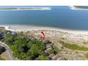 Stunning aerial view showing the building's prime location near the beach at 1332 Pelican Watch Villas, Seabrook Island, SC 29455
