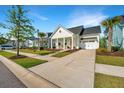 Well-maintained single-Gathering home with attached garage and landscaped front yard at 1521 Pogonia St # 4, Mount Pleasant, SC 29466