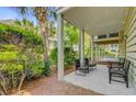Cozy outdoor patio featuring comfortable seating and lush landscaping providing a private retreat at 1650 Long Grove Dr, Mount Pleasant, SC 29464