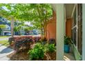 A well landscaped front yard with flowerbeds and green foliage creates a welcoming view at 1823 Chauncys Ct, Mount Pleasant, SC 29466