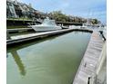 Boat docked on boat lift with water view and houses at 1880 Andell Bluff Blvd # F-3, Seabrook Island, SC 29455