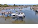 Boat on a lift, showcasing waterfront access and community amenities at 2254 Beckenham Dr, Mount Pleasant, SC 29466