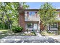 Charming two-story home with red shutters and a landscaped front yard, with a welcoming front porch at 565 Travelers Blvd, Summerville, SC 29485