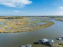 Expansive water view showing proximity to the coast and access to the docks at 7897 Russell Creek Dr, Edisto Island, SC 29438