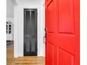 Inviting entryway featuring a bold red front door and a view into the home at 205 Tea Farm Rd, Summerville, SC 29483