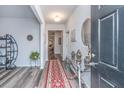 Inviting foyer featuring modern decor, stylish console table, and decorative vases at 224 Hayworth Rd, Summerville, SC 29486