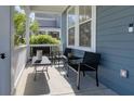Cozy front porch with comfortable seating, perfect for relaxing outdoors at 311 Amaryllis Ave, Summerville, SC 29483