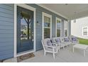 Cozy front porch with seating, perfect for relaxing outdoors at 3130 Sturbridge Rd, Mount Pleasant, SC 29466