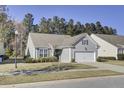 Beautiful one-story home with attached garage and well-maintained landscaping at 534 Four Seasons Blvd, Summerville, SC 29486